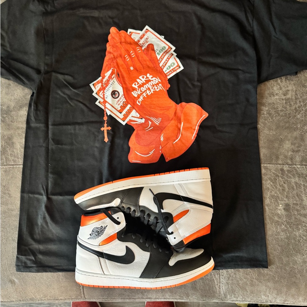 Nike Air Jordan 1 High OG in Black, White, and Orange